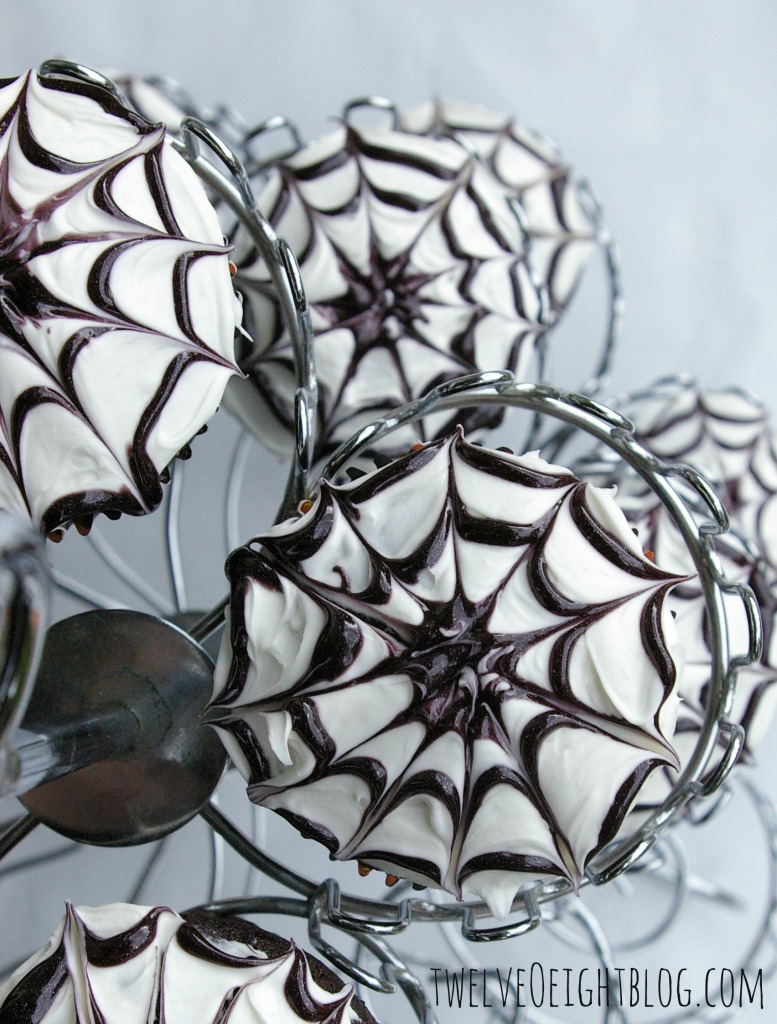 How To Make Spiderweb Cupcakes via twelveOeightblog.com #cupcake #Halloween #SpiderwebCupcake